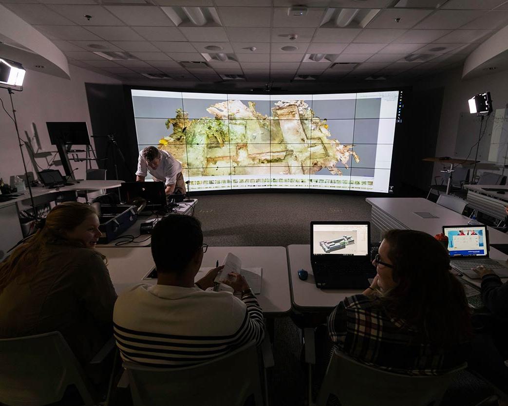 Classroom with a huge floor-to-ceiling curved data display